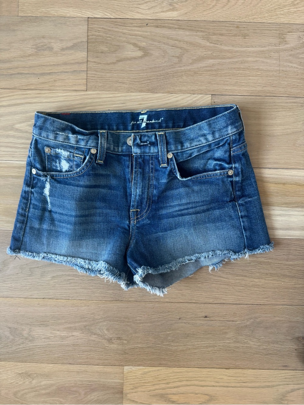 7 For All Mankind Medium Wash Distressed Denim Cutoff Shorts